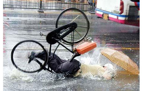 bicycle-accident-flooded-road.jpg